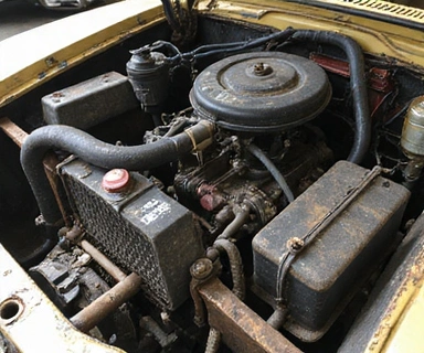 Engine bay before cleaning
